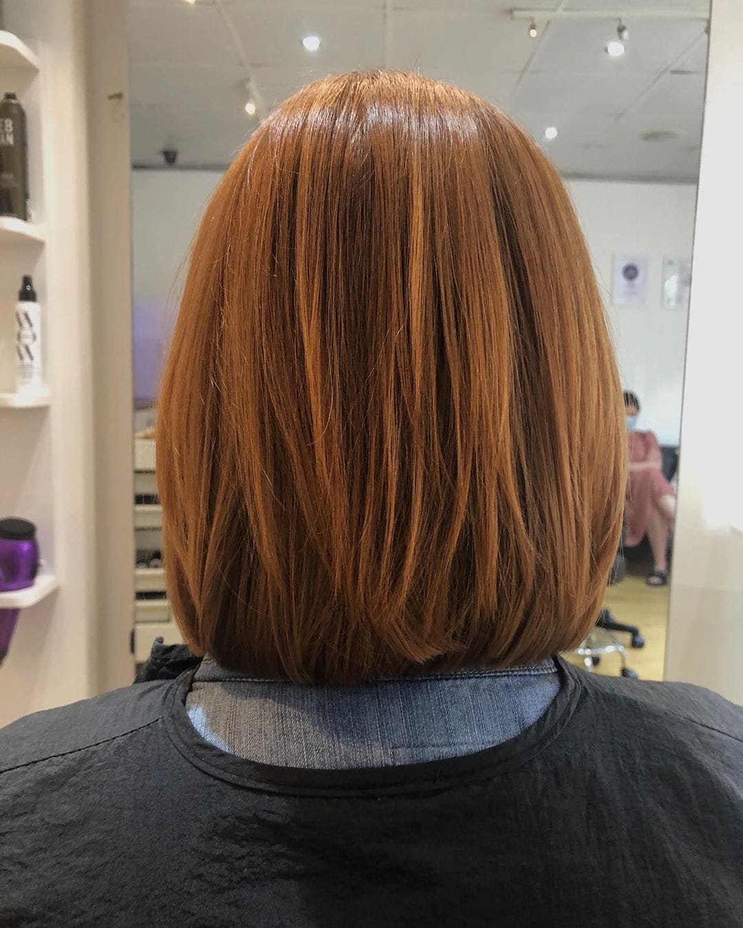Straight copper-brown bob haircut